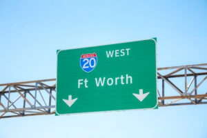Green freeway sign that says i 20 west fort worth
