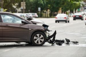 grey car with damage after a crash